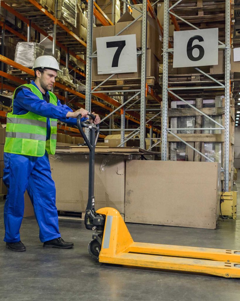 man handling double pallet